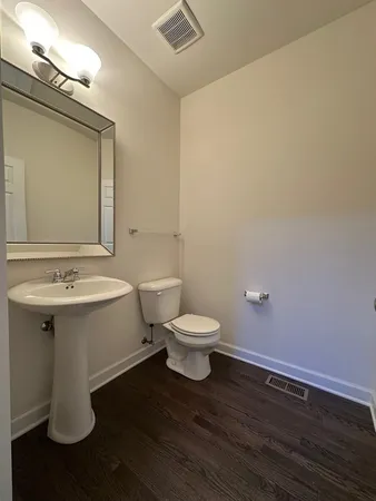 a bathroom with a sink and a toilet