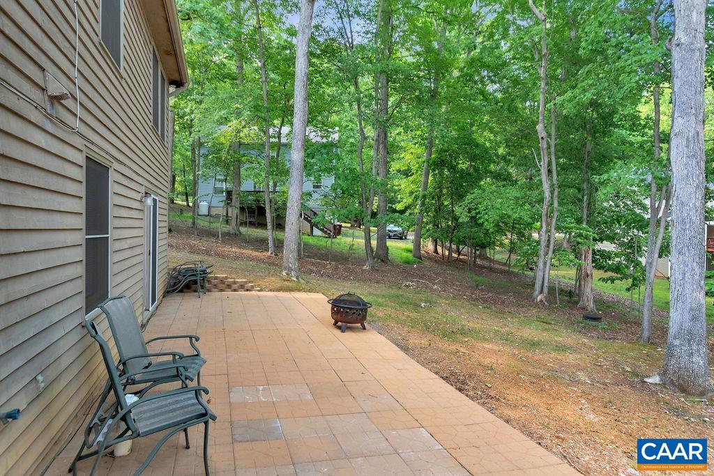 18 Laguna Road Palmyra, VA 22963 - Photo 29 of 34 a view of a backyard with sitting area