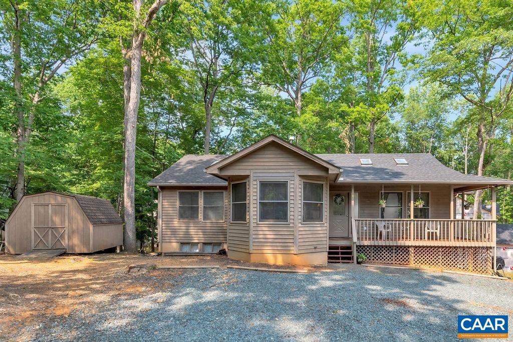 18 Laguna Road Palmyra, VA 22963 - Photo 33 of 34 a front view of a house with a garden and tree
