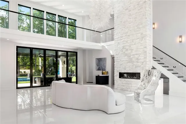 a large kitchen with a table and chairs