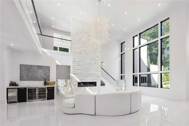 a kitchen with stainless steel appliances granite countertop a stove and a refrigerator