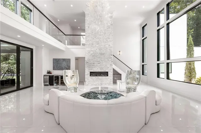 a bathroom with a sink a toilet and a window