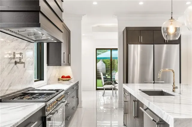 a bathroom with a sink toilet and a mirror