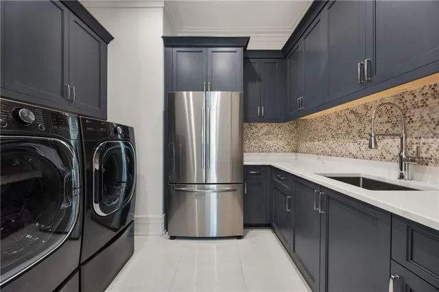 a bathroom with a granite countertop sink a toilet and a mirror