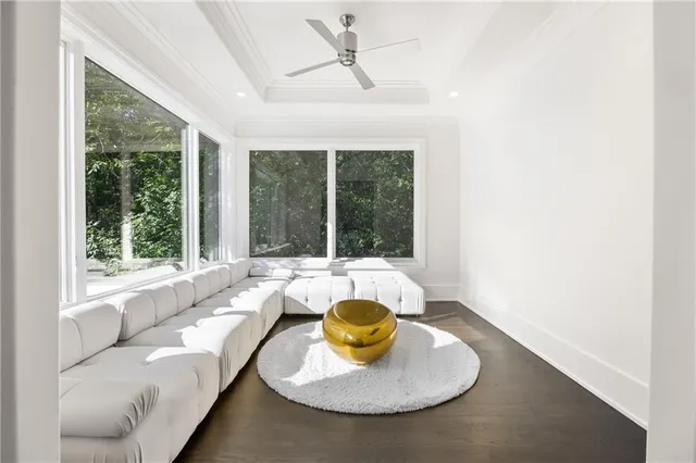 a view of a swimming pool with an outdoor seating