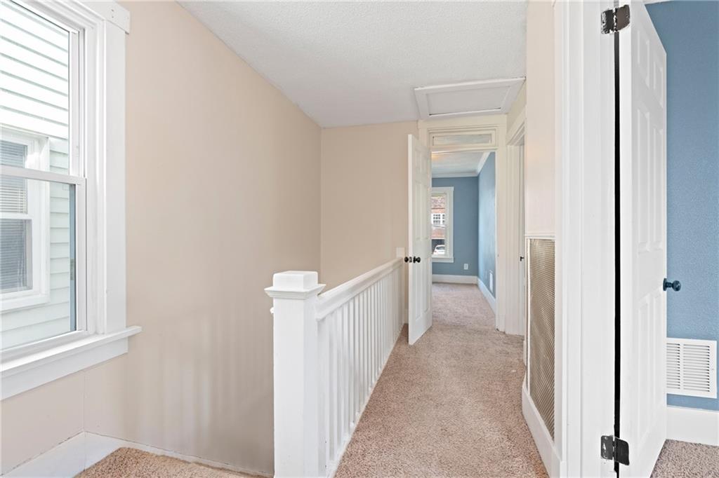 67 Semicir Street Pittsburgh, PA 15214 - Photo 18 of 36 a view of a hallway with a white walls