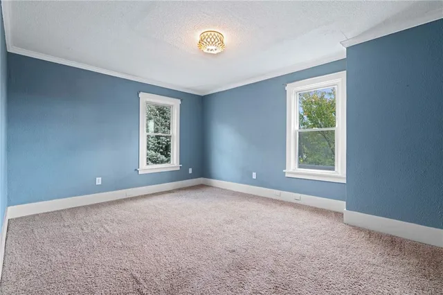 an empty room with windows