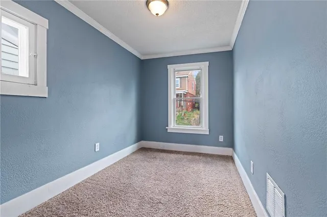 an empty room with windows