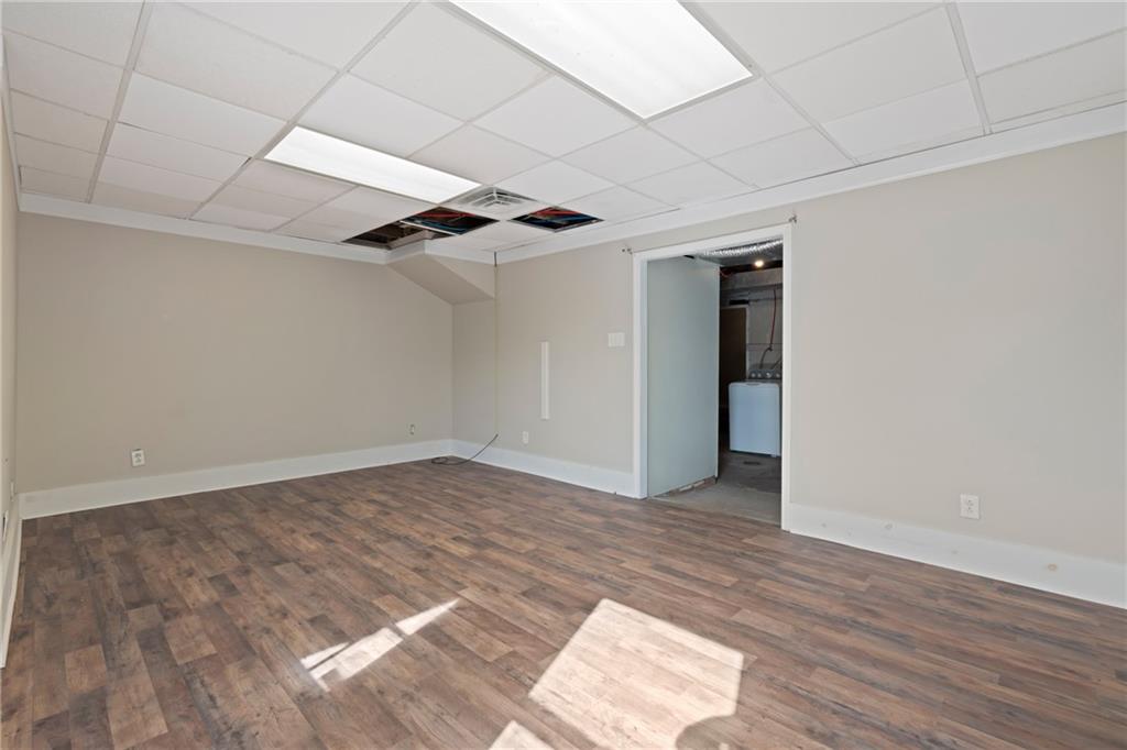 67 Semicir Street Pittsburgh, PA 15214 - Photo 27 of 36 a view of an empty room with wooden floor