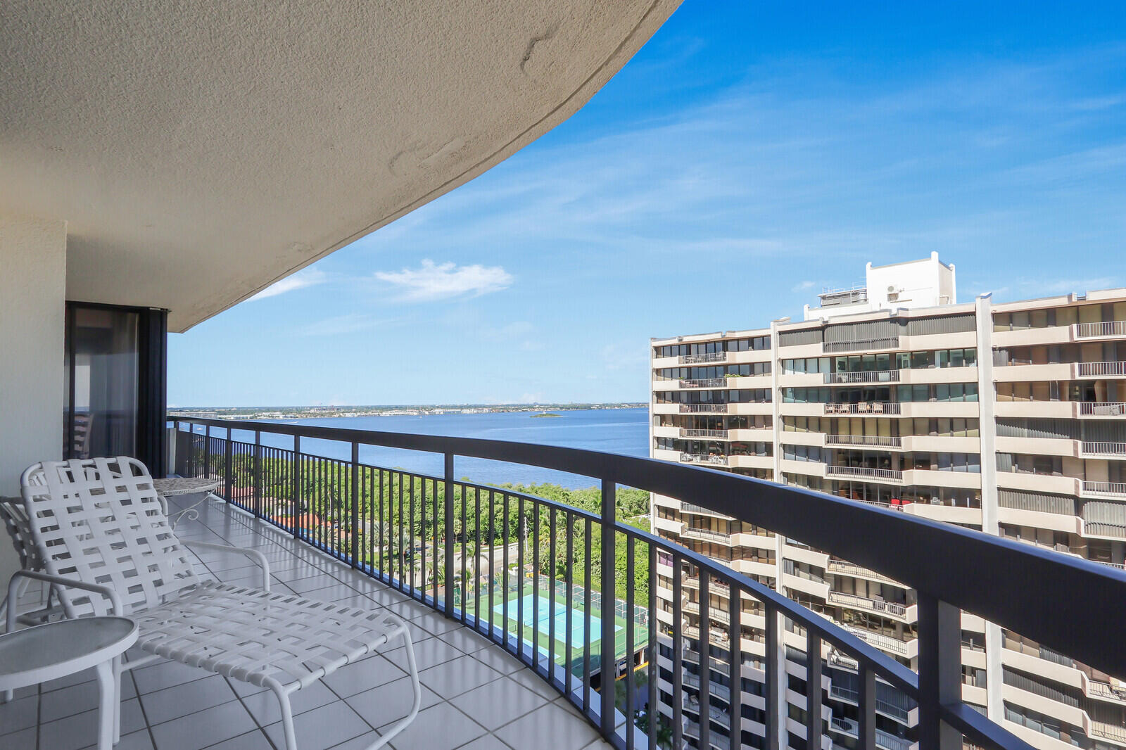 4100 North Ocean Drive, Unit 1501 Singer Island, FL 33404 - Photo 23 of 37 a view of a balcony with an outdoor seating