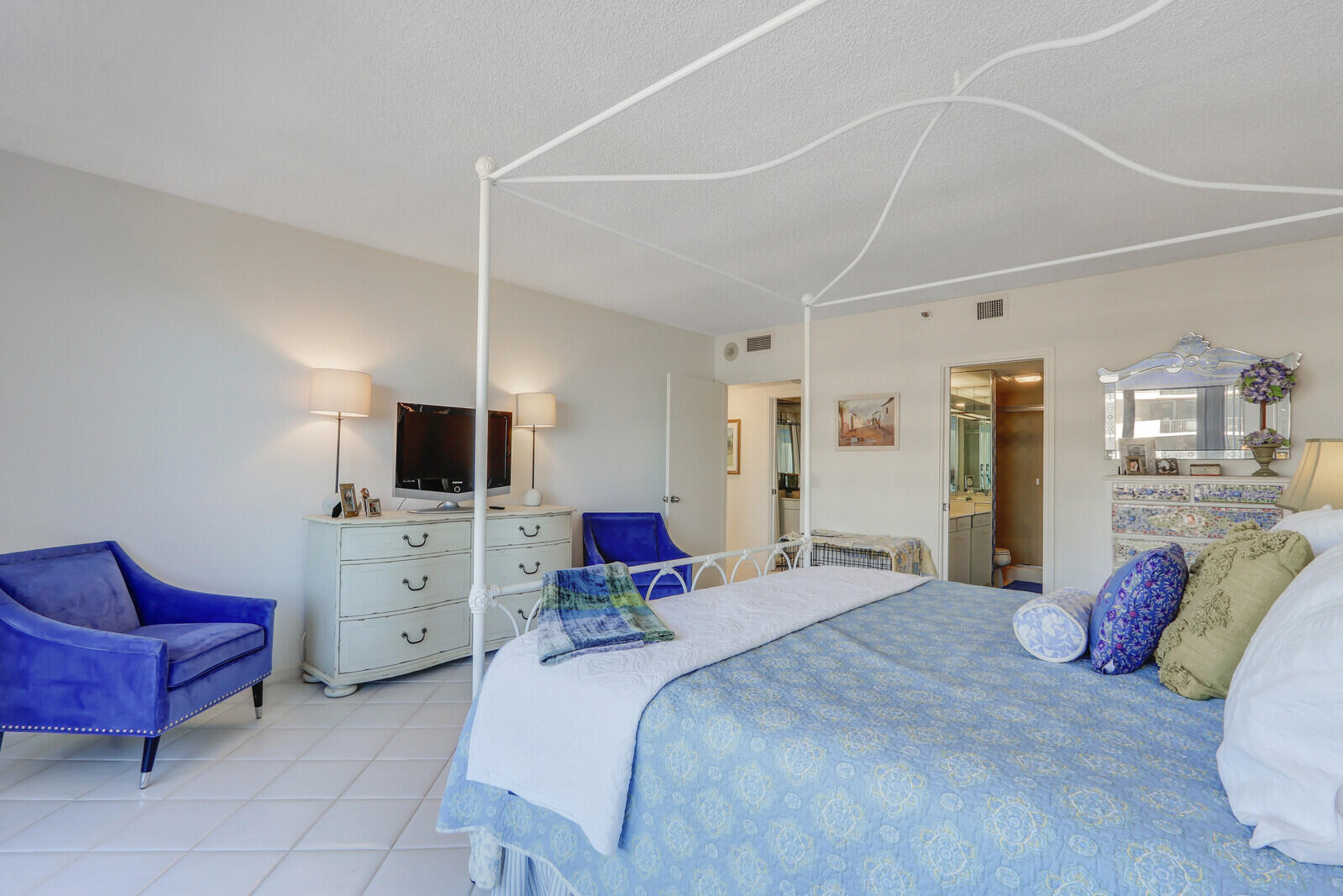 4100 North Ocean Drive, Unit 1501 Singer Island, FL 33404 - Photo 32 of 37 a bedroom with a bed and furniture