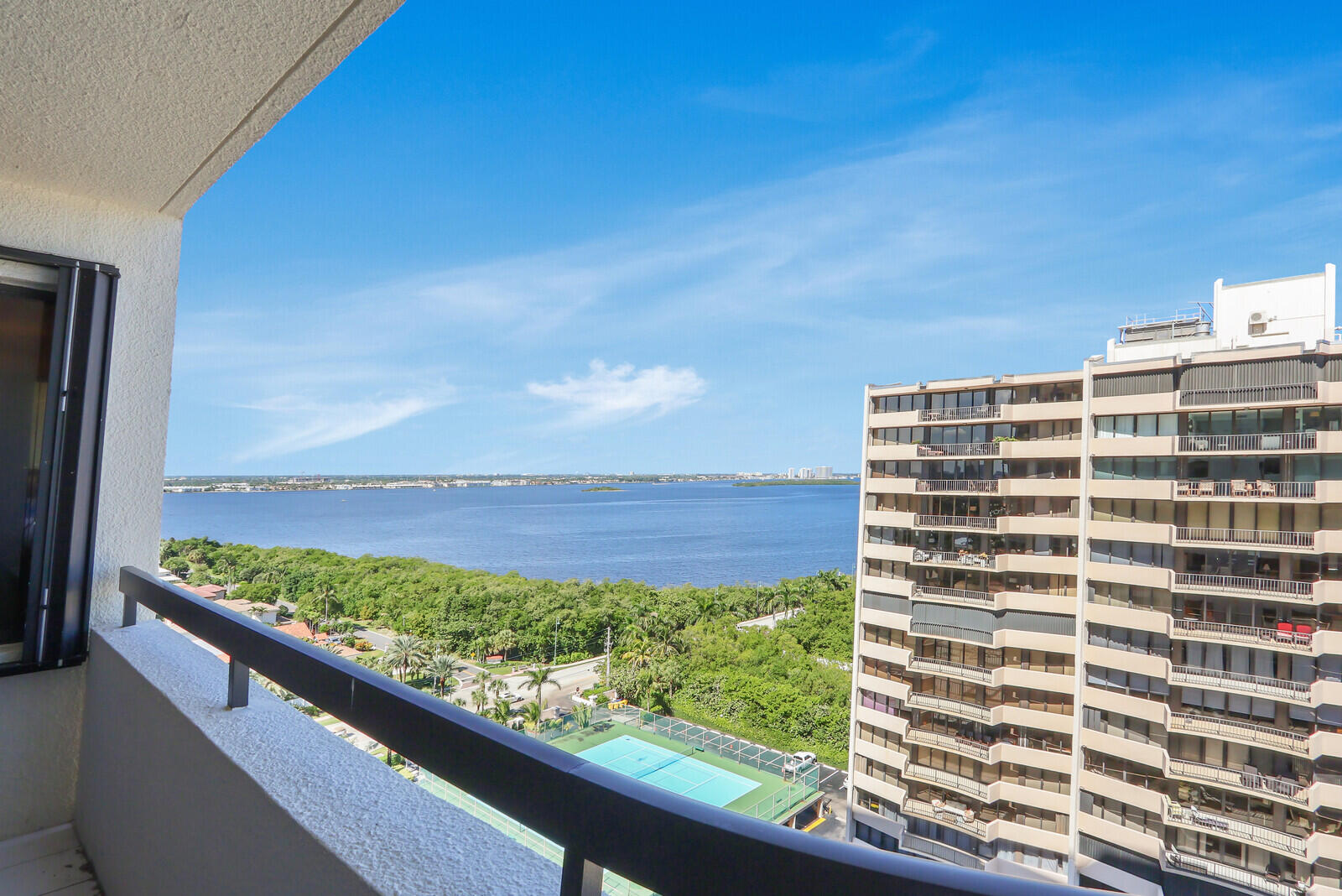 4100 North Ocean Drive, Unit 1501 Singer Island, FL 33404 - Photo 37 of 37 a view of balcony with wooden floor and fence