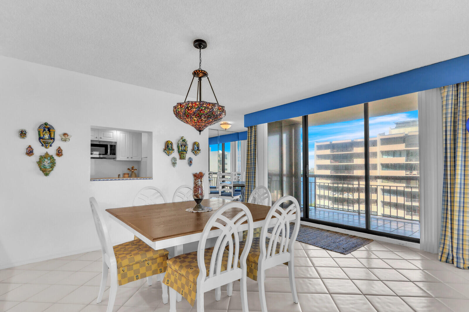 4100 North Ocean Drive, Unit 1501 Singer Island, FL 33404 - Photo 8 of 37 a view of a dining room with furniture window and outside view