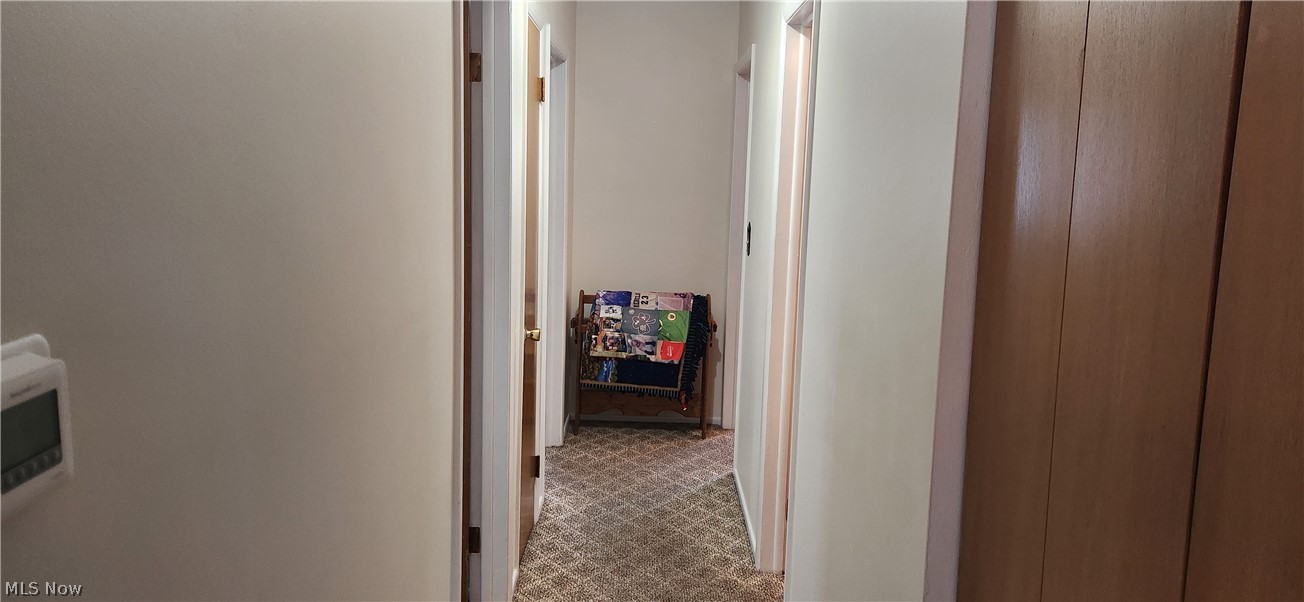 5852 Lake Road Mentor, OH 44060 - Photo 25 of 45 Hallway featuring tile patterned floors