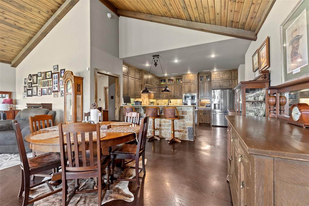 5555 Wright Road Sherman, TX 75092 - Photo 15 of 40 a view of a dining area with furniture and chandelier
