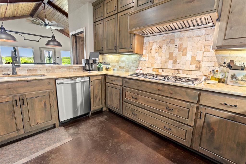 5555 Wright Road Sherman, TX 75092 - Photo 19 of 40 a kitchen with sink cabinets and window