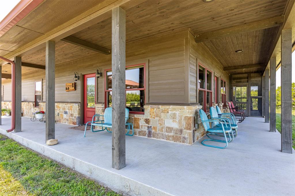 5555 Wright Road Sherman, TX 75092 - Photo 8 of 40 a view of a porch with chairs and backyard