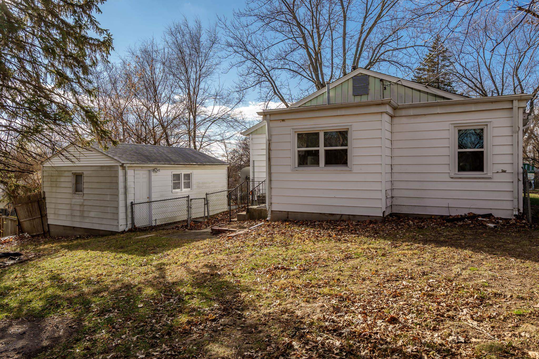 2016 Ridgeland Road Rockford, IL 61108 - Photo 8 of 28 a view of a house with a yard