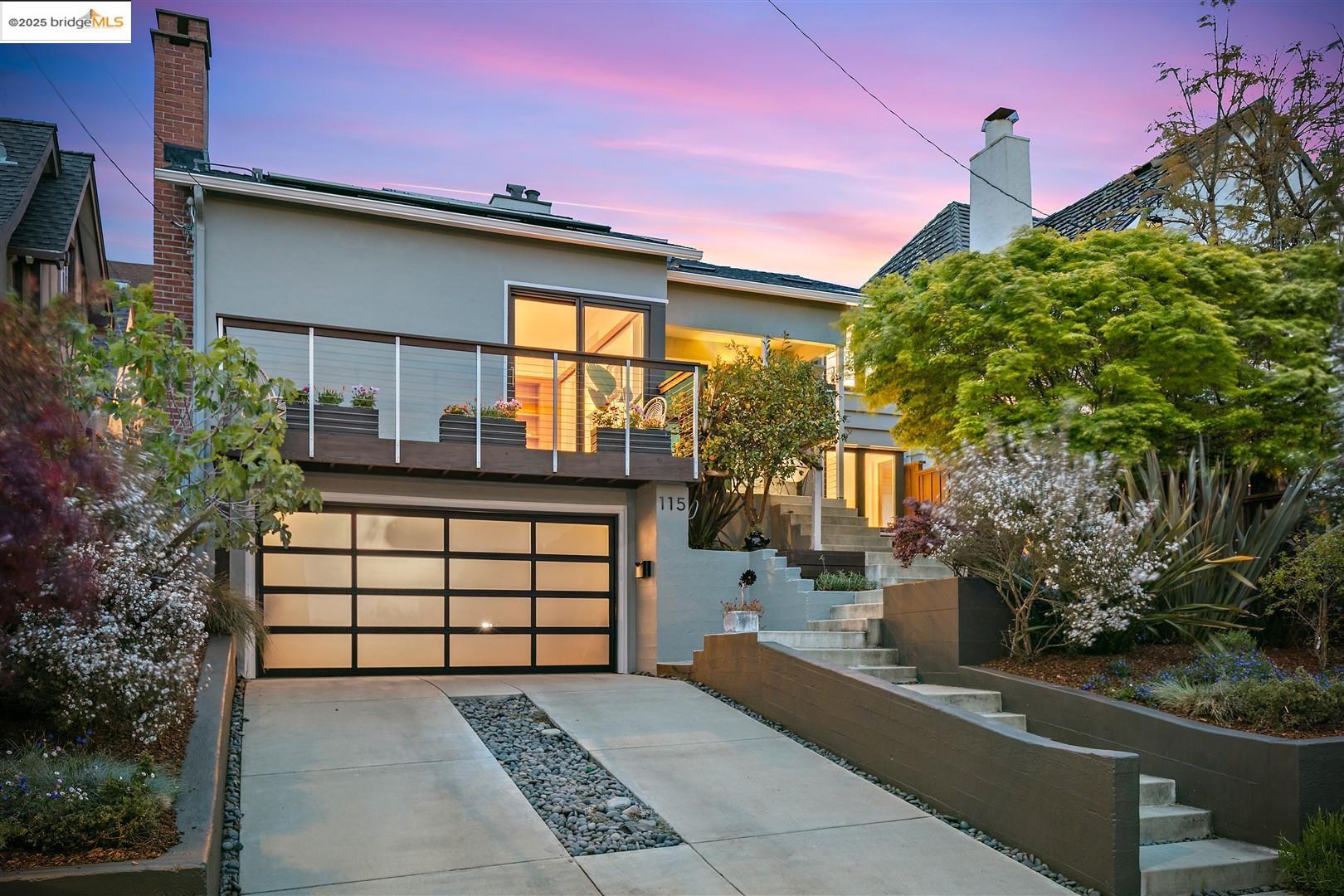a front view of a house with a garage