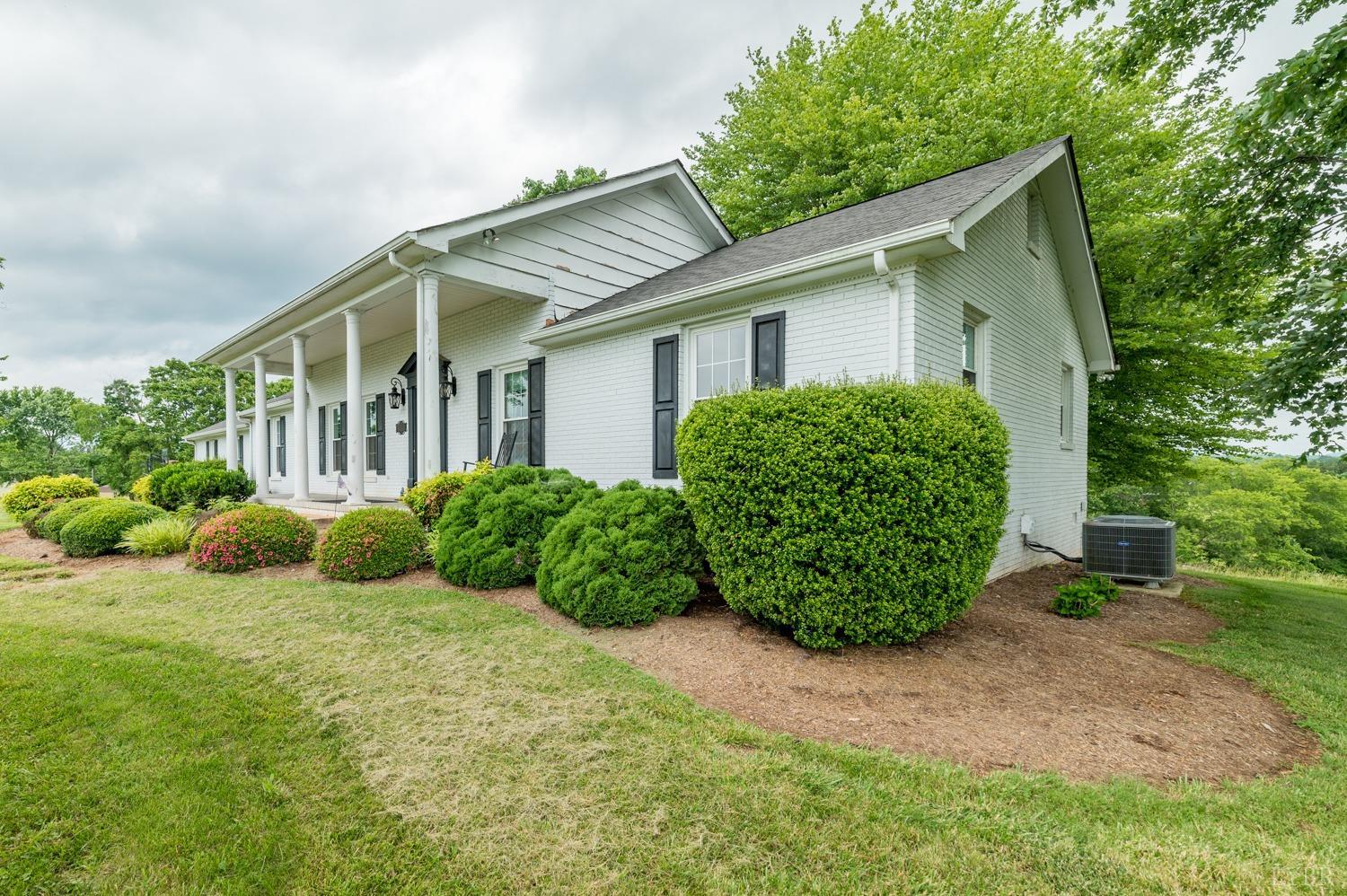 2901 Goode Station Road Goode, VA 24556 - Photo 23 of 57 a view of a house with garden and plants