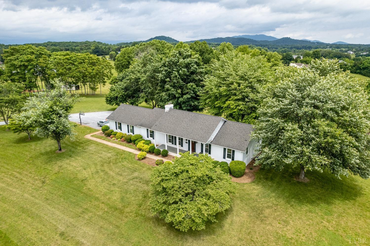 2901 Goode Station Road Goode, VA 24556 - Photo 26 of 57 an aerial view of a house with a garden