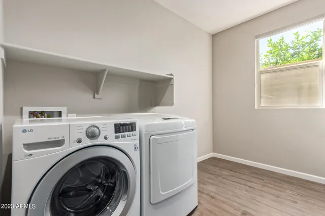a utility room with dryer and washer