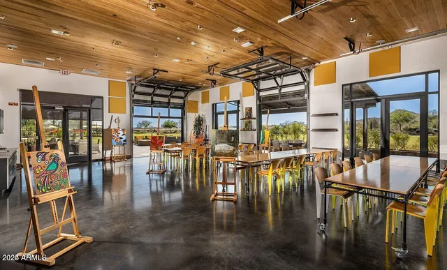 a view of an chairs and tables in the patio