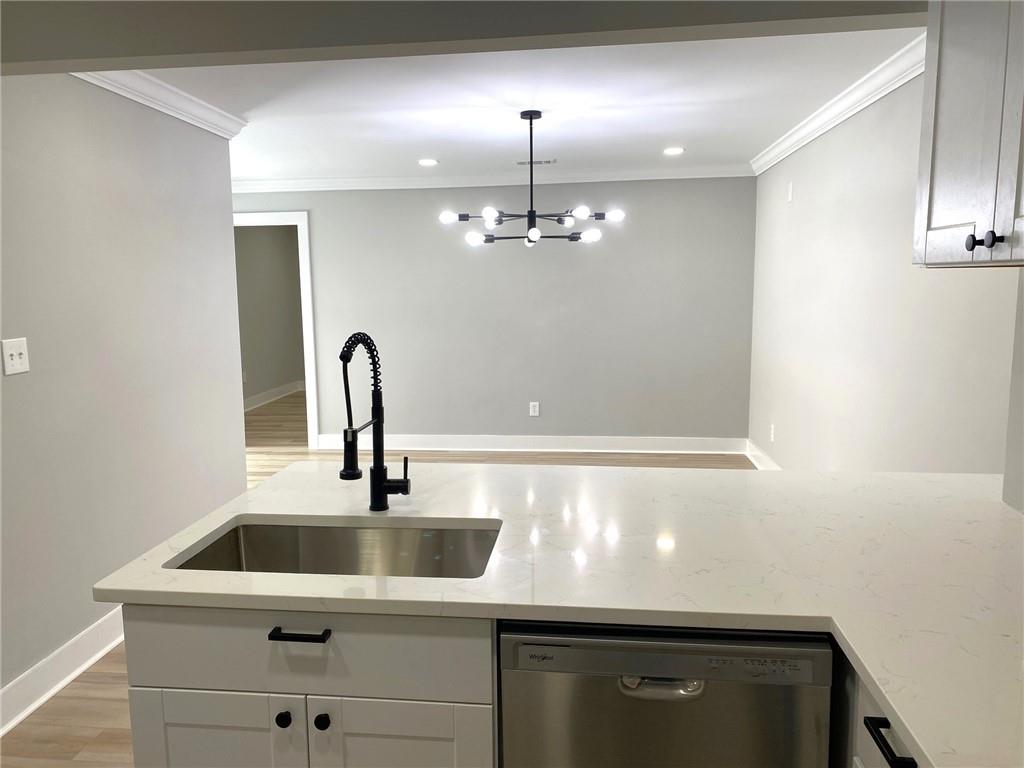 700 Appleton Drive Southeast Marietta, GA 30008 - Photo 15 of 52 a close view of a sink a counter space and utility room