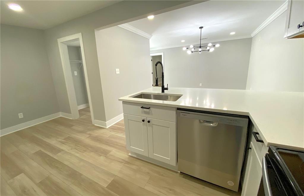 700 Appleton Drive Southeast Marietta, GA 30008 - Photo 16 of 52 a bathroom with a sink vanity and a mirror
