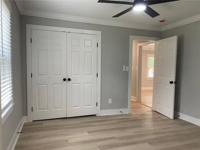 a bathroom with a sink and a window