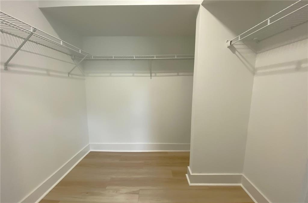 700 Appleton Drive Southeast Marietta, GA 30008 - Photo 36 of 52 a view of an empty walk in closet