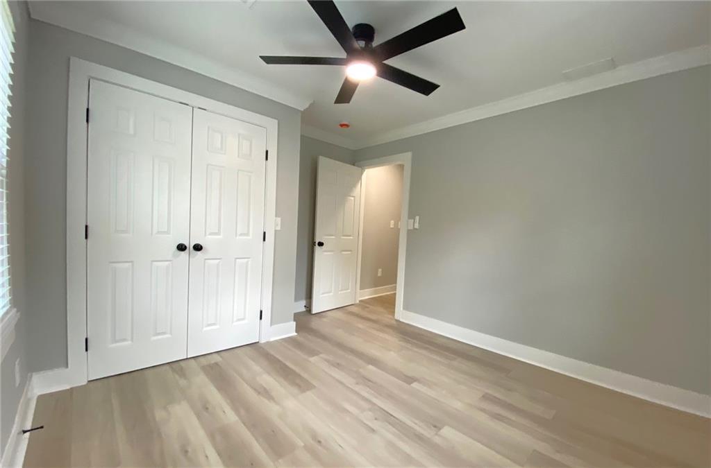 700 Appleton Drive Southeast Marietta, GA 30008 - Photo 42 of 52 wooden floor in an empty room