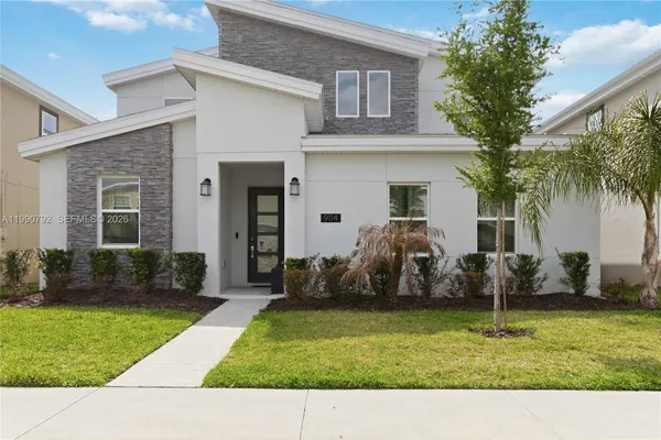 a house view with a garden space