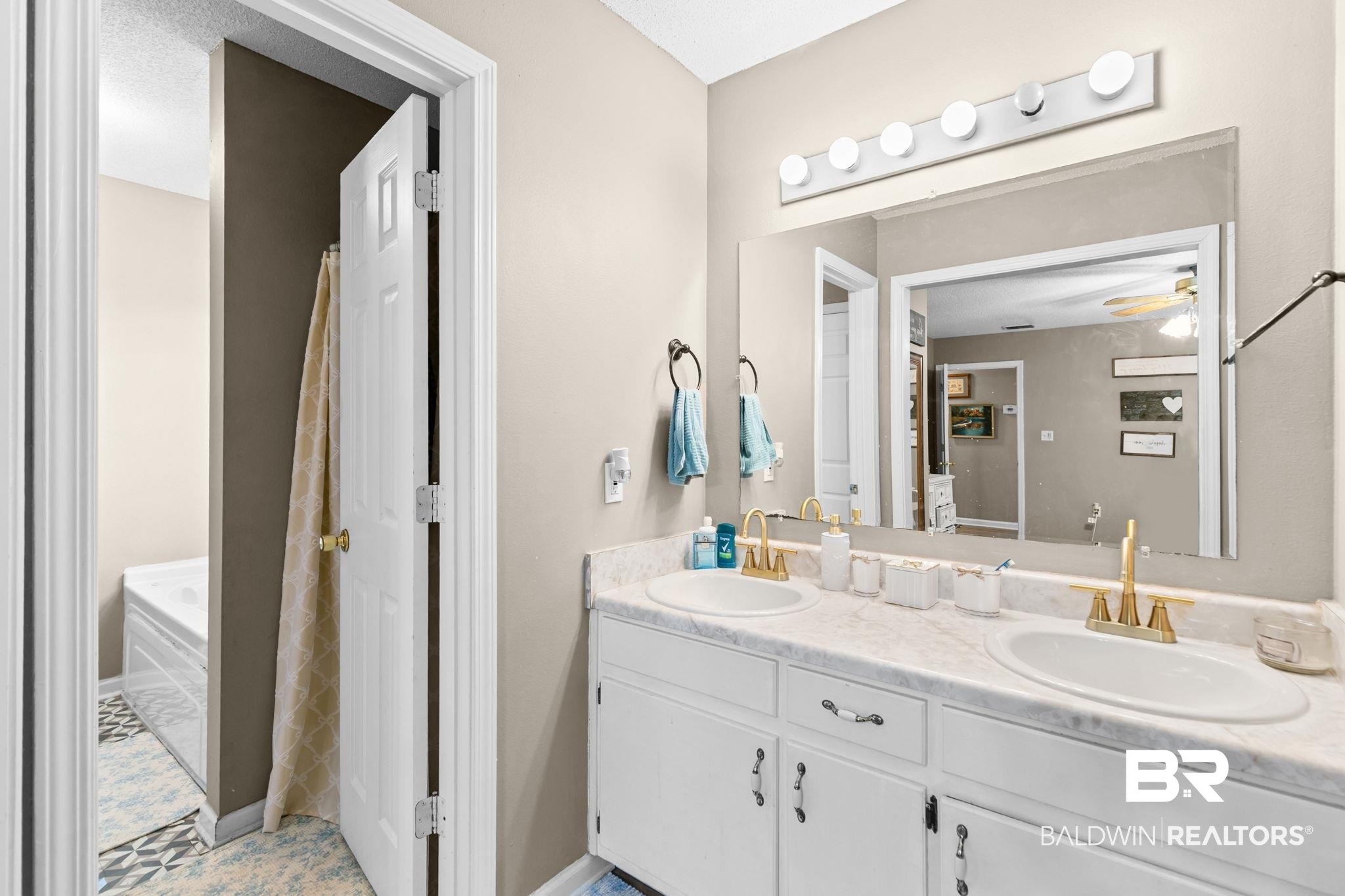 3842 Experiment Farm Road Monroeville, AL 36460 - Photo 35 of 59 Bathroom featuring double vanity and ceiling fan