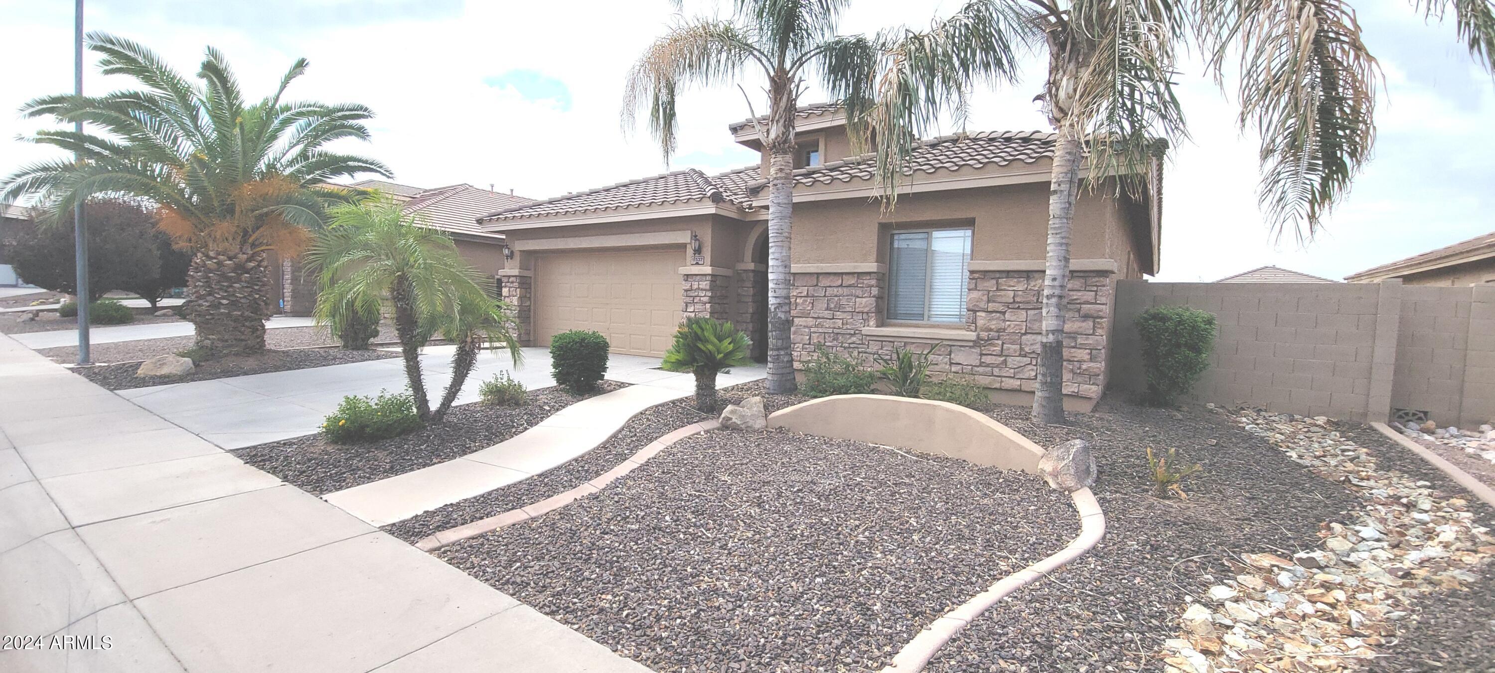 a view of a house with a patio