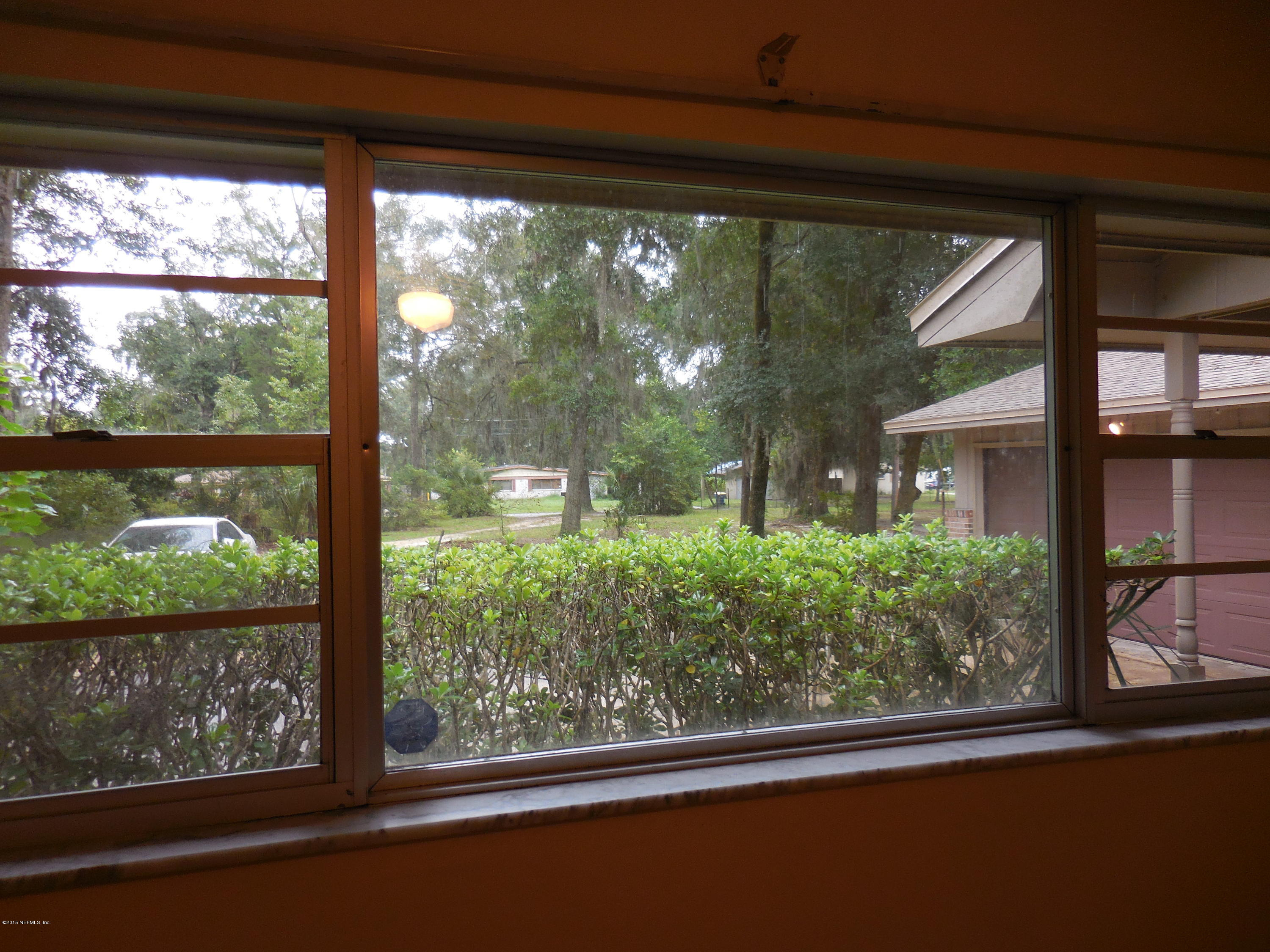 10402 Tulsa Road Jacksonville, FL 32218 - Photo 13 of 34 a view of a building from a window