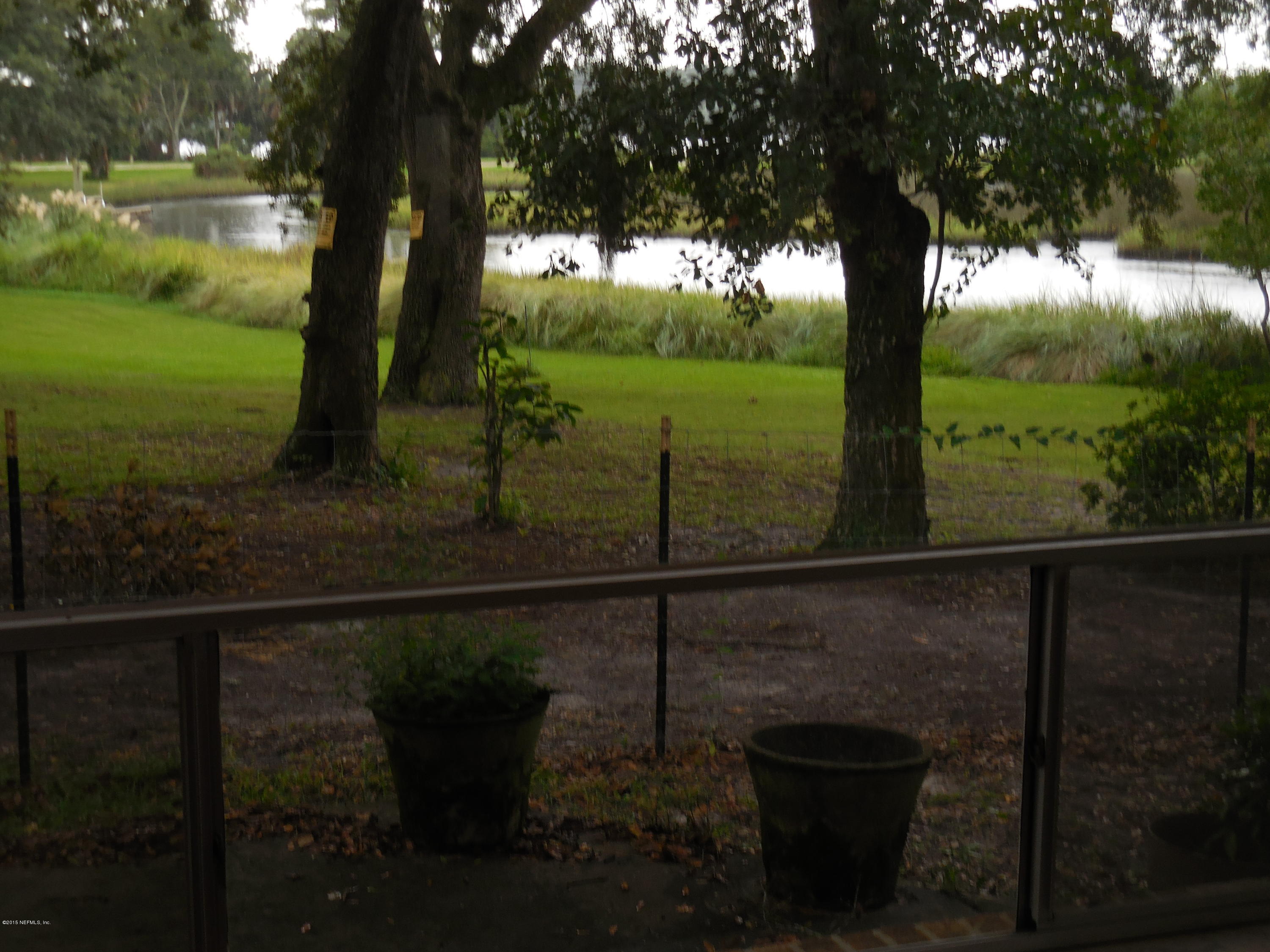 10402 Tulsa Road Jacksonville, FL 32218 - Photo 28 of 34 a view of a lake from a balcony