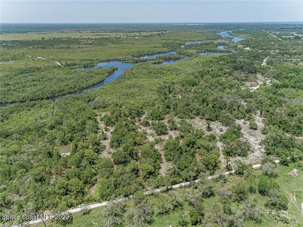 10995 Roseland Road Sebastian, FL 32958 - Photo 15 of 35 a view of a field with an ocean