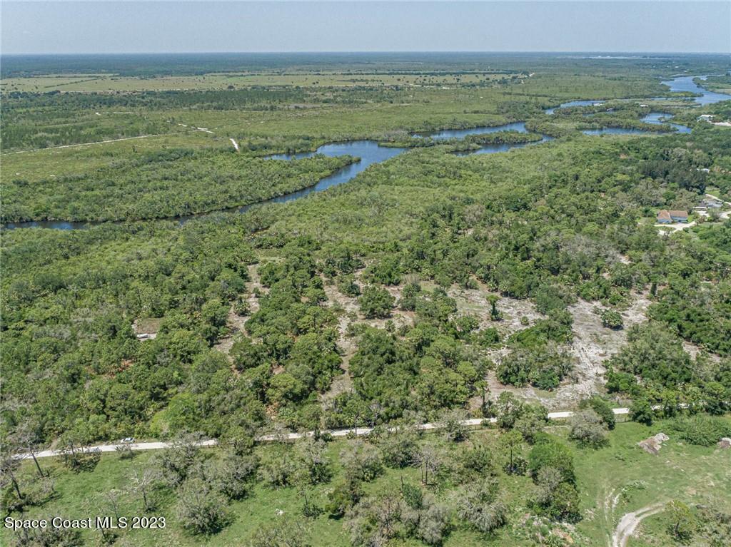 10995 Roseland Road Sebastian, FL 32958 - Photo 16 of 35 a view of a field with an ocean view
