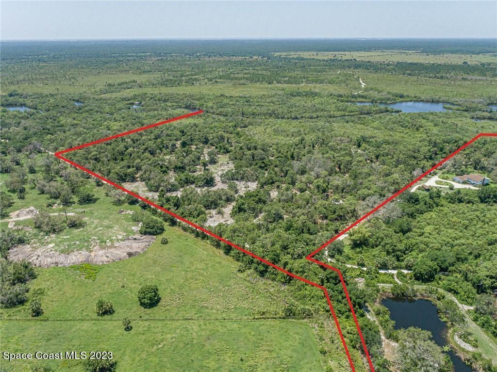 10995 Roseland Road Sebastian, FL 32958 - Photo 2 of 35 a view of a field with an ocean
