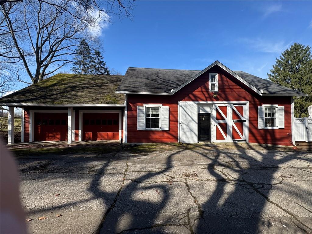 411 Water Works Road Sewickley, PA 15143 - Photo 1 of 36 a front view of a house with a yard