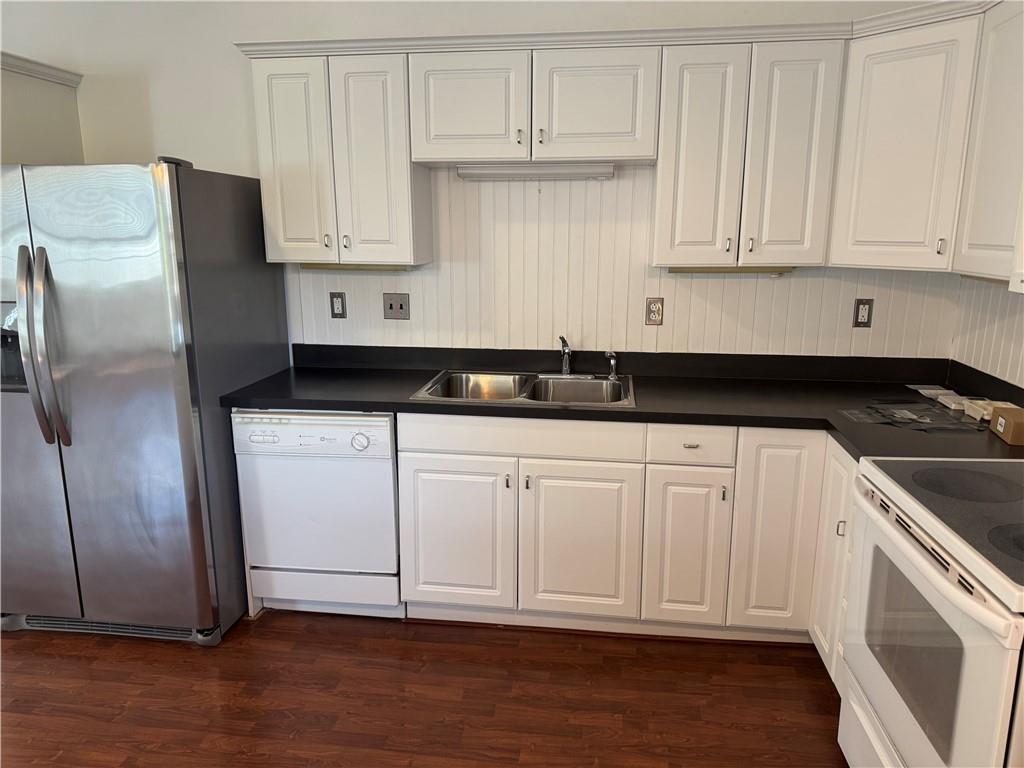411 Water Works Road Sewickley, PA 15143 - Photo 11 of 36 a kitchen with granite countertop white cabinets and stainless steel appliances