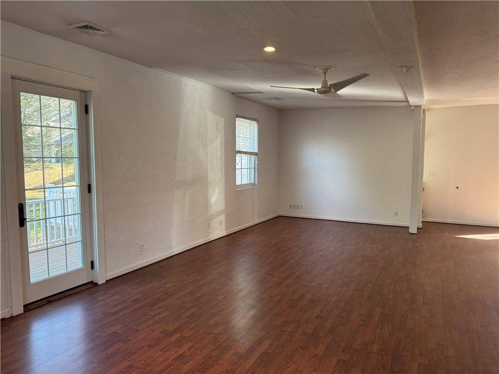 411 Water Works Road Sewickley, PA 15143 - Photo 15 of 36 an empty room with wooden floor and windows