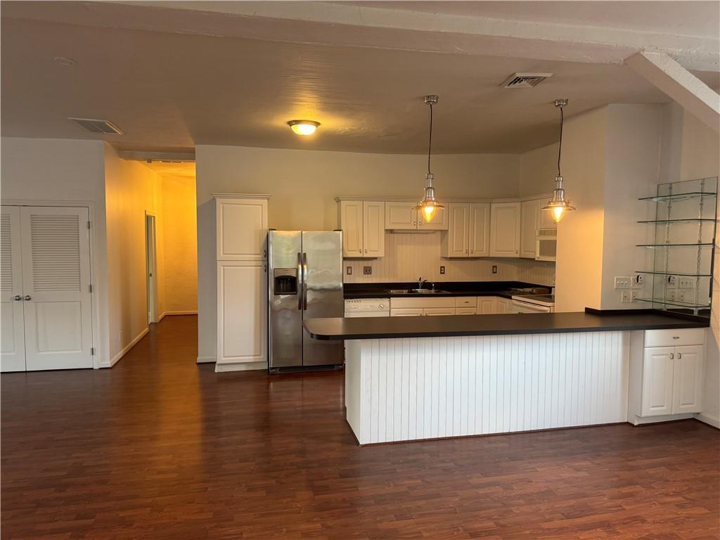 411 Water Works Road Sewickley, PA 15143 - Photo 16 of 36 a kitchen with stainless steel appliances granite countertop a sink a refrigerator and a stove