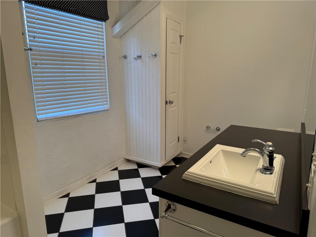 411 Water Works Road Sewickley, PA 15143 - Photo 25 of 36 a bathroom with a sink and a mirror