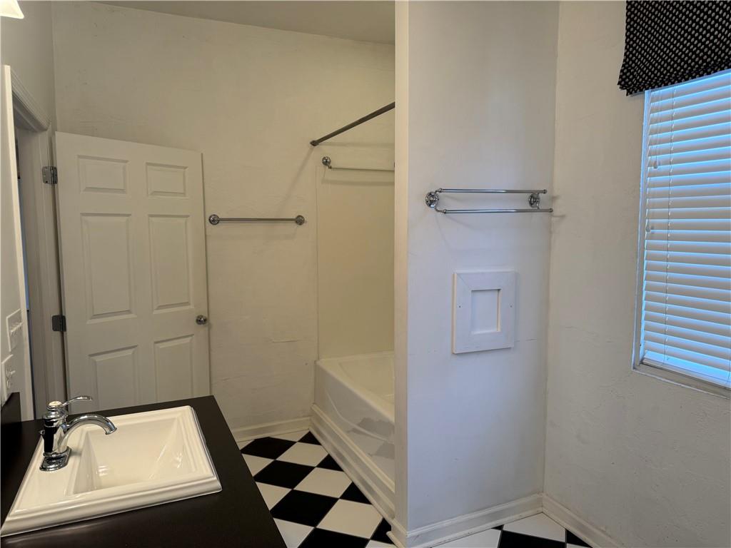 411 Water Works Road Sewickley, PA 15143 - Photo 27 of 36 a bathroom with a sink a toilet a shower and mirror