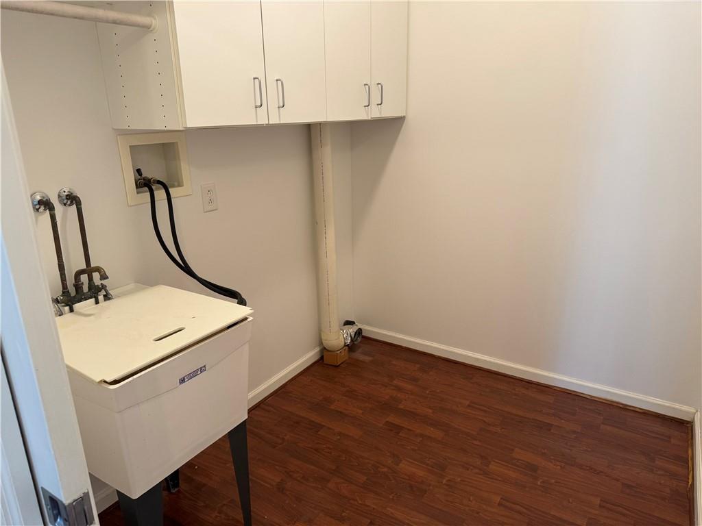 411 Water Works Road Sewickley, PA 15143 - Photo 29 of 36 a room with wooden floor and white walls