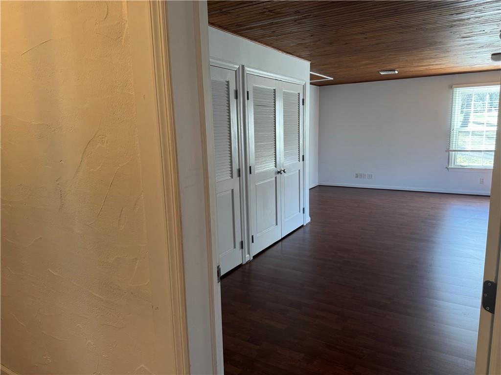 411 Water Works Road Sewickley, PA 15143 - Photo 30 of 36 an empty room with wooden floor door and windows