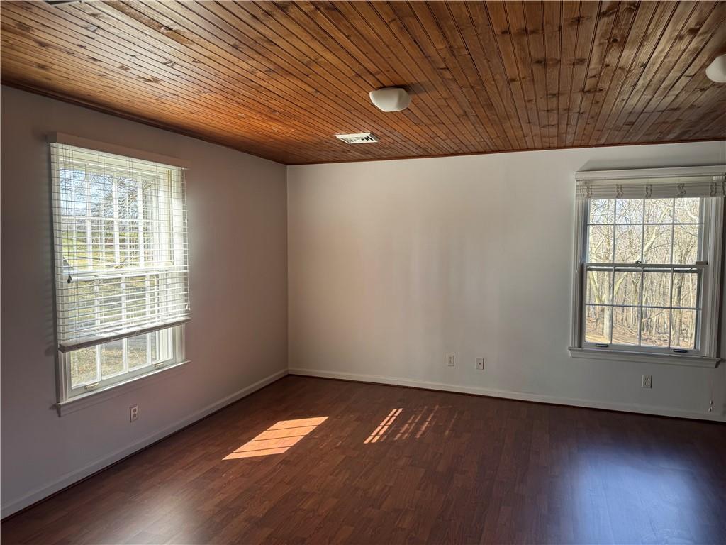 411 Water Works Road Sewickley, PA 15143 - Photo 33 of 36 an empty room with wooden floor and windows