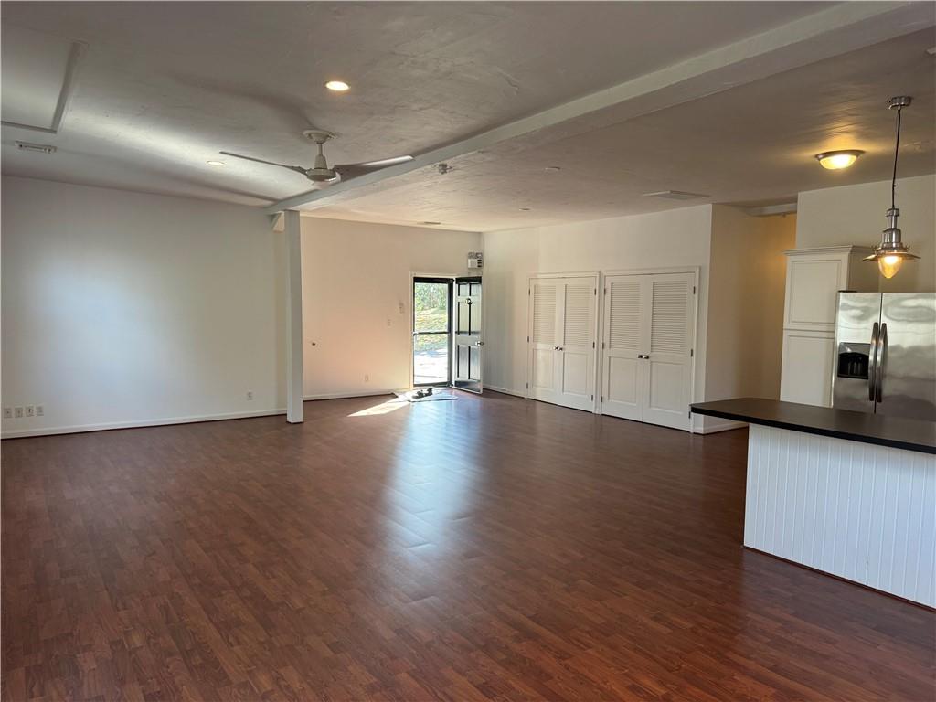 411 Water Works Road Sewickley, PA 15143 - Photo 7 of 36 an empty room with wooden floor and windows